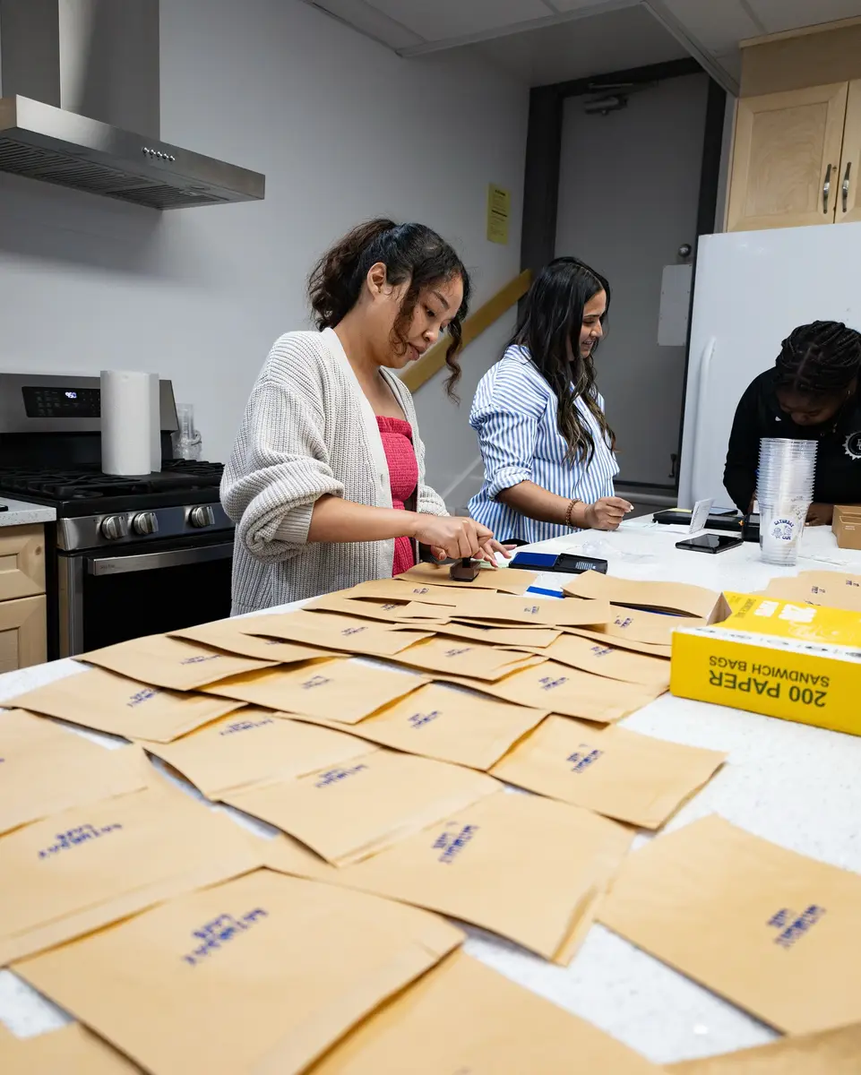 The team preparing orders in the kitchen
