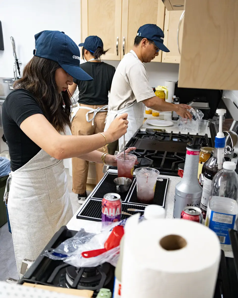 A barista crafting drinks